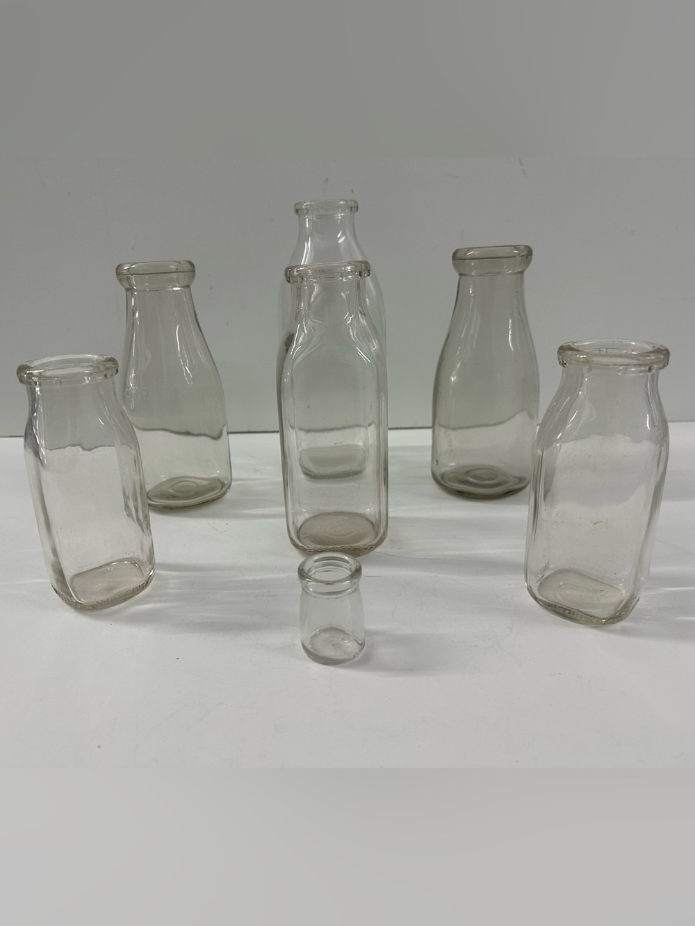 Vintage Clear Glass Milk Bottle Collection